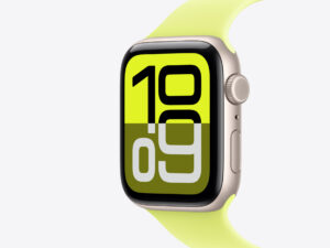 Close-up of a smartwatch with a lime green band and large digital numbers on screen.