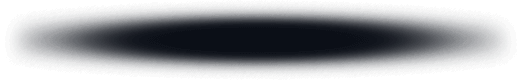 A dark rectangular blackboard with small chalk marks at the bottom.